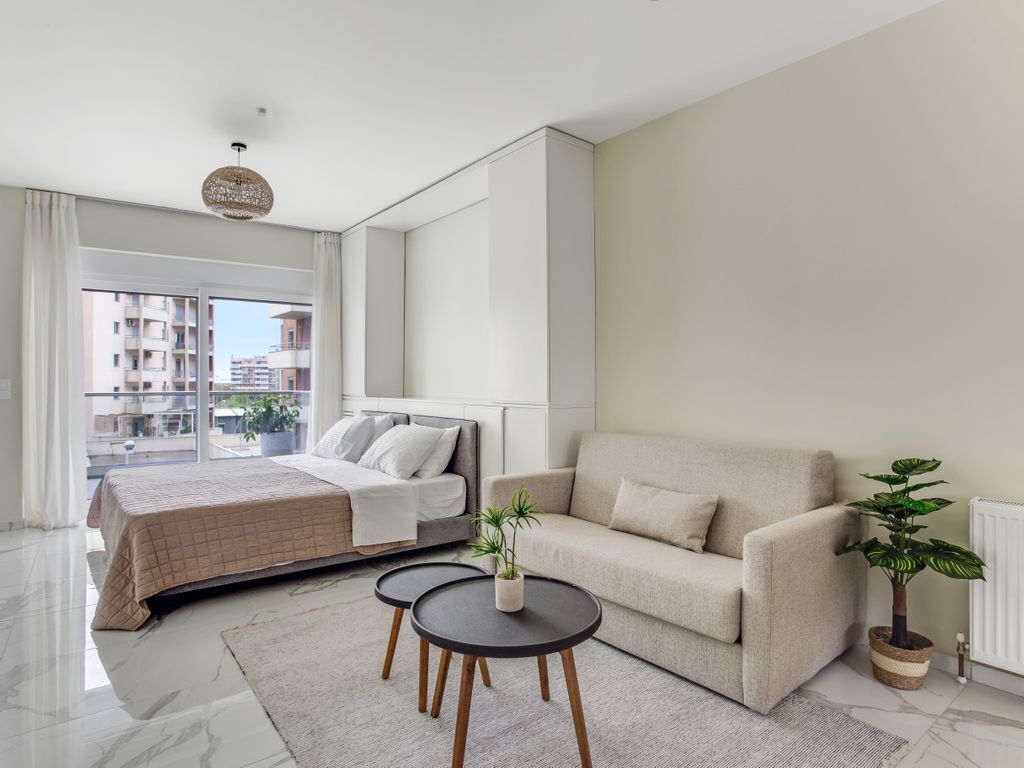 Studio, Balcony, City View | Living area