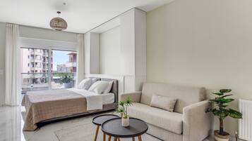 Studio, Balcony, City View | Living area