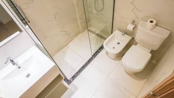 Superior Studio | Bathroom | Shower, hair dryer, towels, soap
