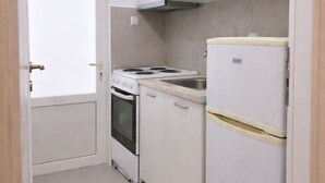 Căn hộ tiện nghi đơn giản, quang cảnh sân vườn | Bếp riêng