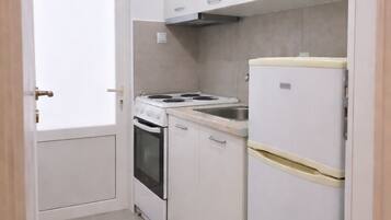 Apartament Comfort, vistes al pati | Cuina privada