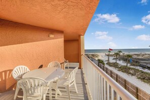 Outdoor dining - 🌊Buena Vista 203 | Balcony w/Gulf Views + Community Pool | Beachfront Complex (Gulf Shores)