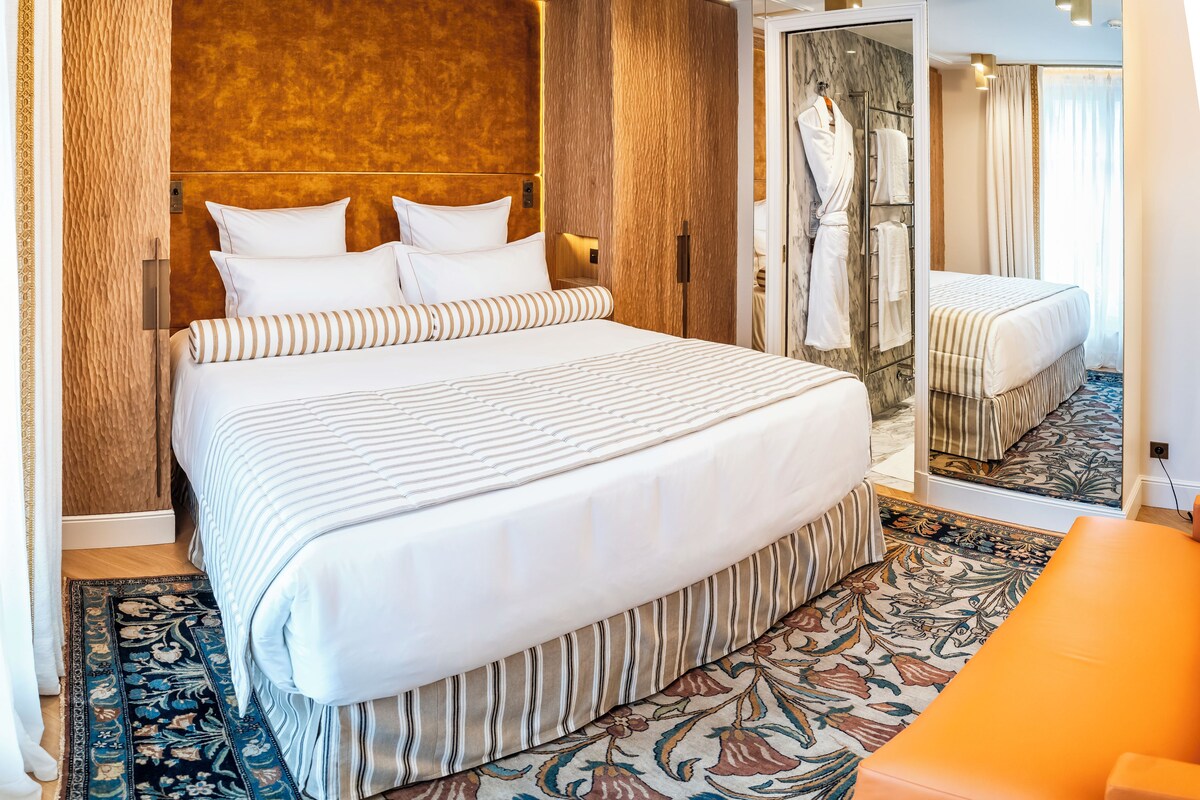 Deluxe Double Room, City View | In-room safe, desk, laptop workspace, blackout drapes