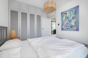 2 slaapkamers, een strijkplank/strijkijzer, gratis wifi, beddengoed