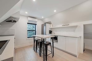 Sleek dining setup perfect for meals or remote work.