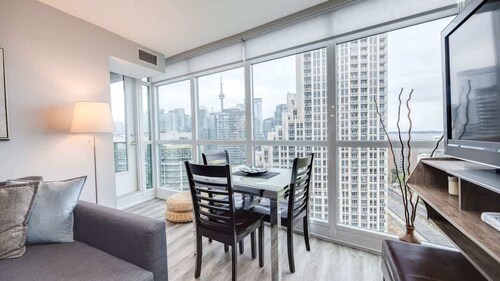 CN Tower Views • 2BR+Den Condo w/ Parking