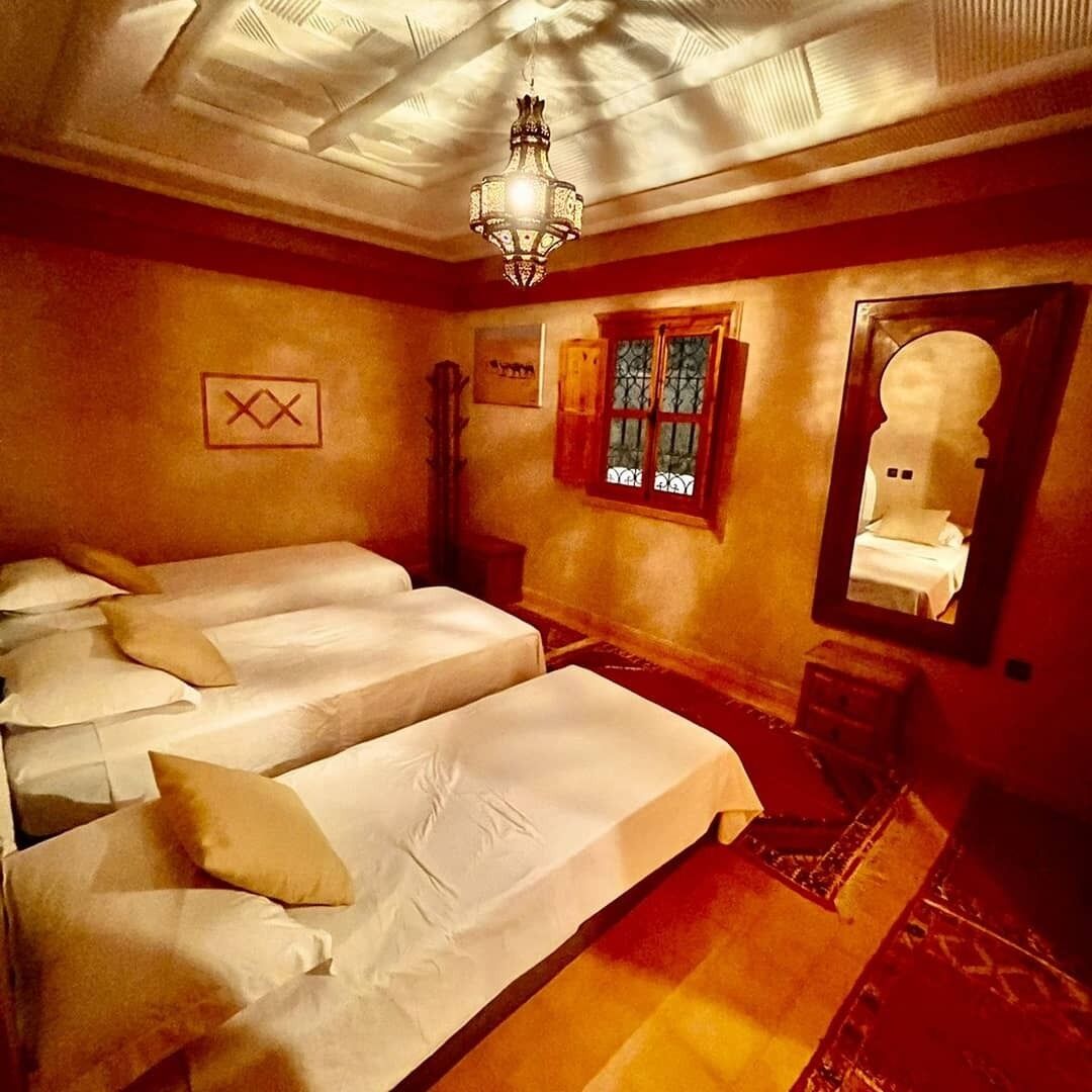 Quarto triplo conforto, vista para o jardim