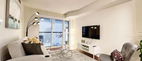 Standard Suite, 1 Bedroom | Living area | Flat-screen TV