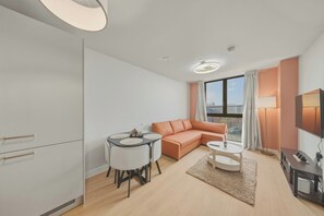 Leilighet, 1 kingsize-seng med sovesofa, ikke-røyk, tekjøkken | Oppholdsområde