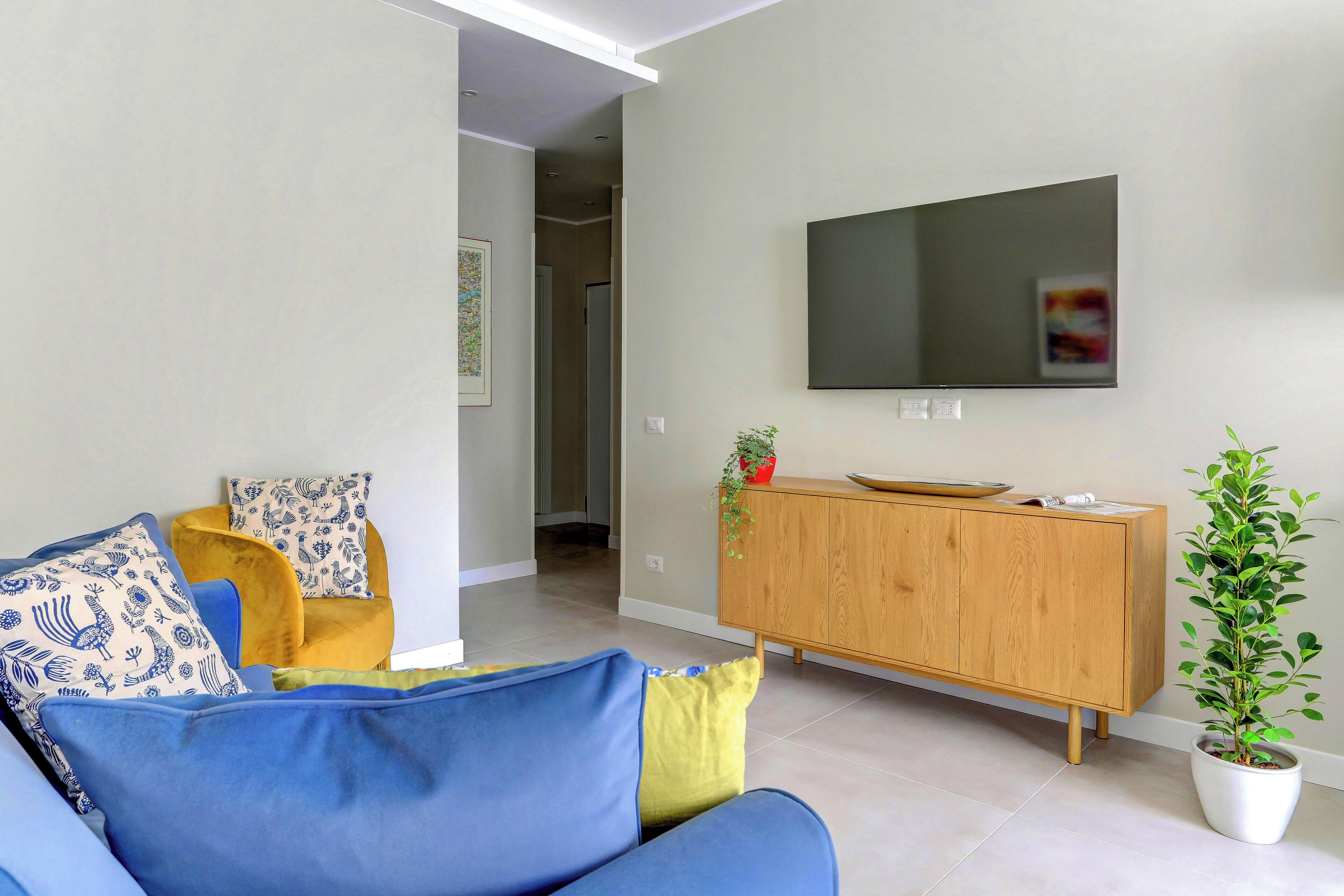 Comfort Apartment | Living area | 40-inch Smart TV with digital channels