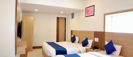 Deluxe Double Room, City View | Desk, laptop workspace, free WiFi