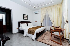 Family Room, Balcony, City View | Desk, laptop workspace, blackout drapes, soundproofing - The Mason By Trovardig (Abuja)