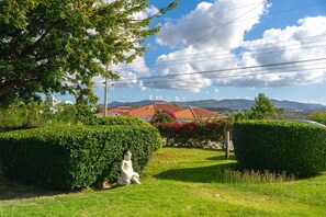 Property grounds - Spacious one bedroom studio with a large patio in a private garden setting (St. John)