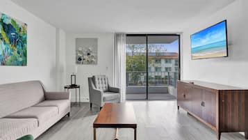 Deluxe kamer, 1 queensize bed, niet-roken, privébadkamer | Woonruimte