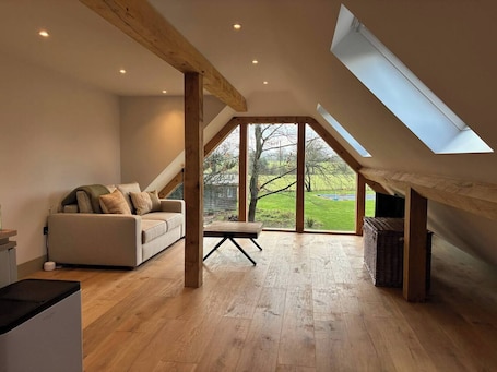 Living area. The Loft – 1 bed space with gated parking