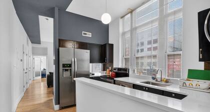 Modern Corner 1BR w/ Views | Near Harbor & Stadium