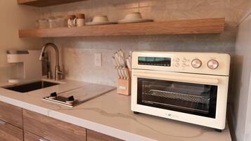 Fridge, oven, cookware/dishes/utensils