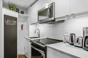 Fridge, microwave, oven, stovetop - Mountain Loft Retreat | 1-Bed | Steps to Downtown (Canmore)