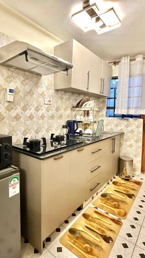 Private kitchen - Serene 1-bedroom apartment in vibrant Nairobi perfect for your stay (Nairobi)