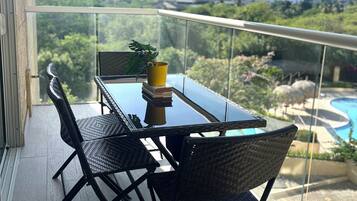 Apartment, Pool View | Outdoor dining