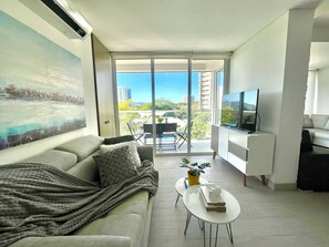 Apartment, Pool View | Living area - Apto. con terraza piscinas y playa (Santa Marta)
