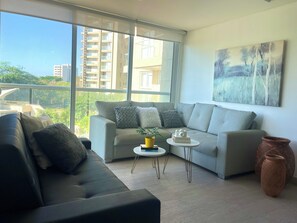 Apartment, Pool View | Living area - Apto. con terraza piscinas y playa (Santa Marta)