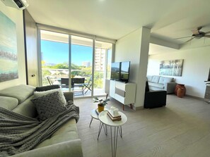 Apartment, Pool View | Living area | 50-inch flat-screen TV with digital channels - Zazue Beach Apartments by Xarm Apartments (Santa Marta)