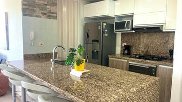 Leilighet, bassengutsikt | Eget kjøkken