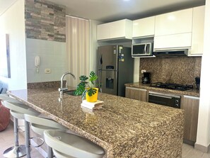 Apartment, Pool View | Private kitchen - Apto. con terraza piscinas y playa (Santa Marta)