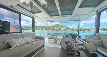 Luxury Catamaran /private mooring Coral Bay water access only – dinghy provided