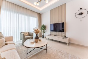 TV - City Living 1BR Near Coca-Cola Arena and Park, Few Minutes Walk to the Metro (Dubai)
