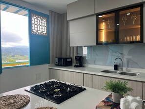 Apartment, Balcony, Valley View | Private kitchen | Microwave, oven, stovetop, coffee/tea maker - Filandia Boutique Apartments by Xarm Apartments (Filandia)