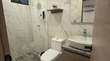 Shower, free toiletries, hair dryer, towels