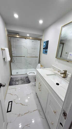 Shower, bidet, towels, soap