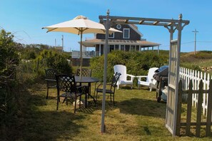 Outdoor dining - Oceanfront Apartment  Steps into Town (New Shoreham)