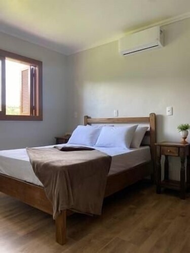 A cozy retreat in the Vale dos Vinhedos (Valley of the Vineyards). House of the Vineyards.