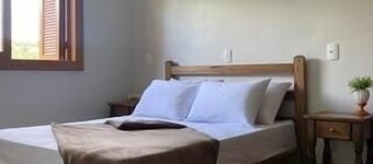 A cozy retreat in the Vale dos Vinhedos (Valley of the Vineyards). House of the Vineyards.