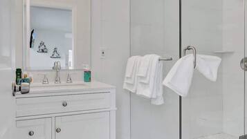 Shower, hair dryer, shampoo