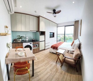 Deluxe Studio, Balcony, City View | Private kitchen | Fridge, microwave, oven, stovetop - Hanoi Aurelia Stay (Tay Ho)