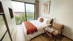 Deluxe Studio, Balcony, City View | Minibar, desk, laptop workspace, blackout drapes - Hanoi Aurelia Stay (Tay Ho)