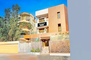 A modern townhouse with a sign indicating it is company-serviced. - Deluxevijaya Residency (Visakhapatnam)