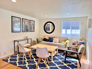 Living area - NEW! Peaceful Bungalow • Train to World Cup Matches • Yard (Seattle)