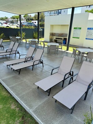 Outdoor dining - Luxury apartment with swimming pool in the city with spectacular view to the forest. (45130)