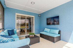 Terrace/patio - Family Retreat 15 minutes to Disney Parks. Private Heated Pool. (Kissimmee)