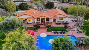 A large house with a swimming pool, patio, and mountain views. - 20 beds,2 pkleball+bball, 5 acre estate gameroom (Bermuda Dunes)