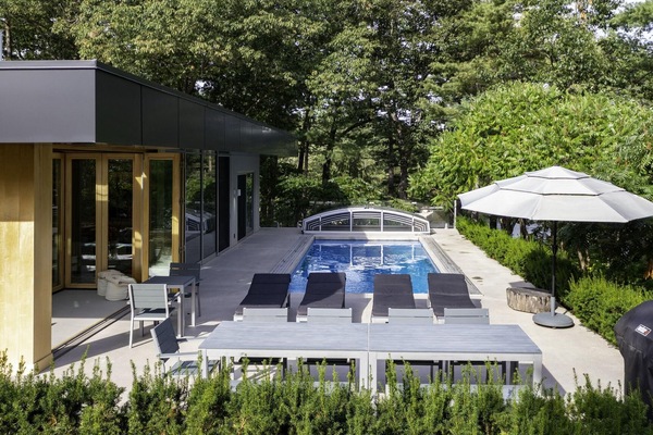Poolside patio with chaise lounges for sun soaked relaxation