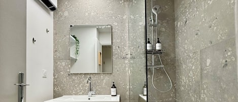 Hair dryer, towels, soap, shampoo