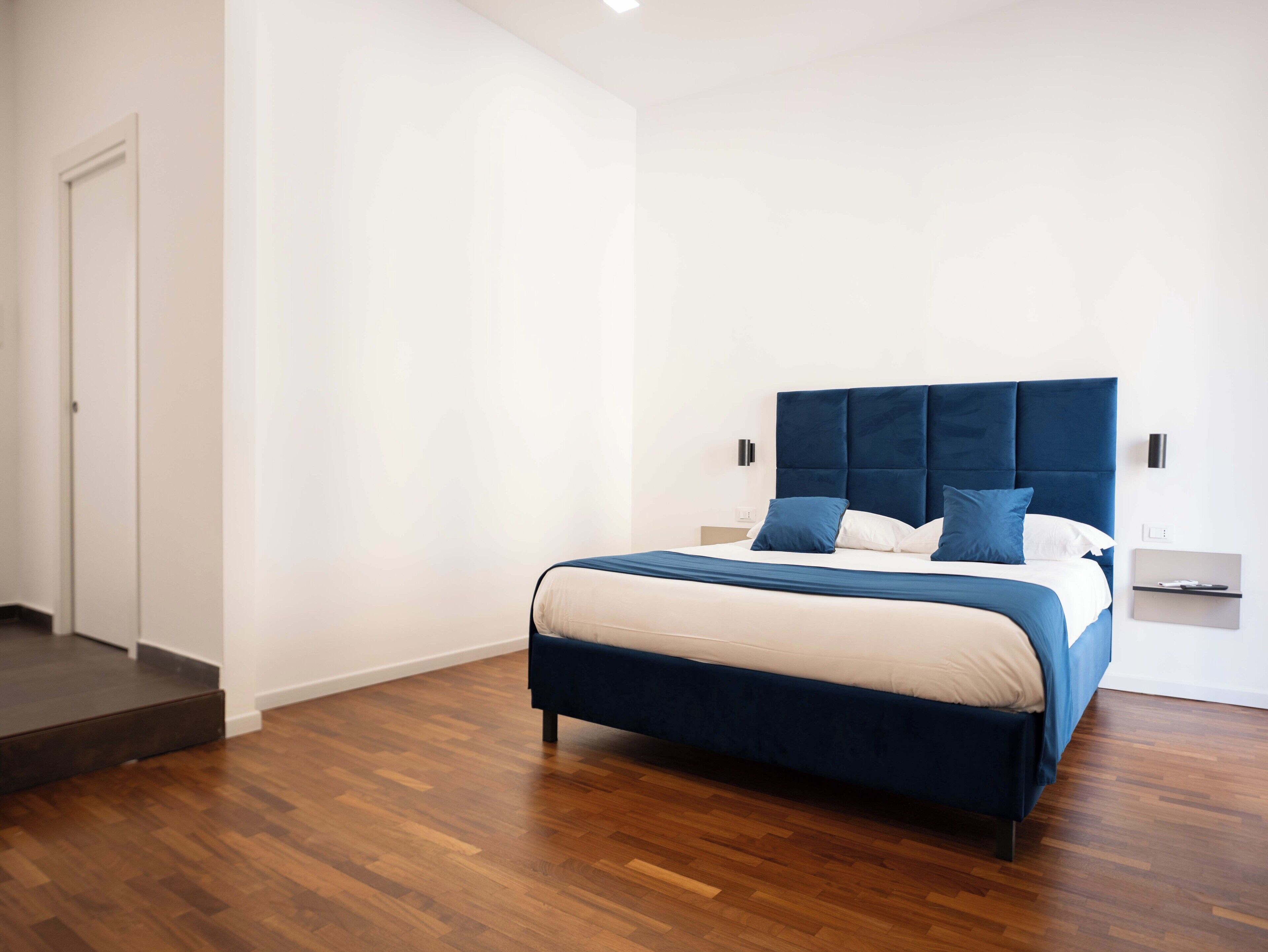 Deluxe vierpersoonskamer, uitzicht op de stad