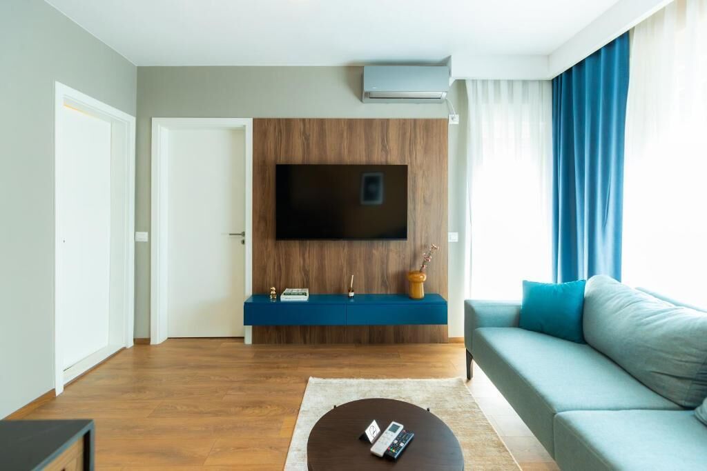 Deluxe appartement, balkon, uitzicht op stad | Woonruimte