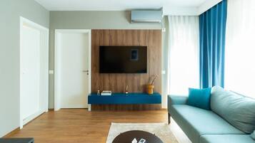 Deluxe appartement, balkon, uitzicht op stad | Woonruimte